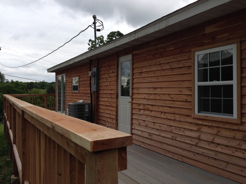 Deck with Sliding glass doors on Left and side door on Right - 378 Gunnison