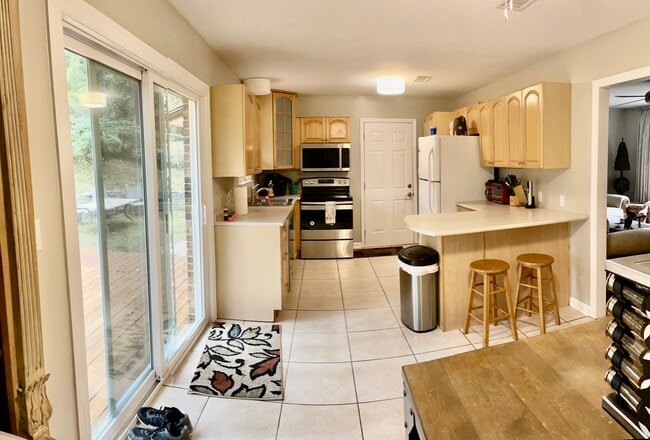 kitchen with counter seating - 1803 Salmon Dr