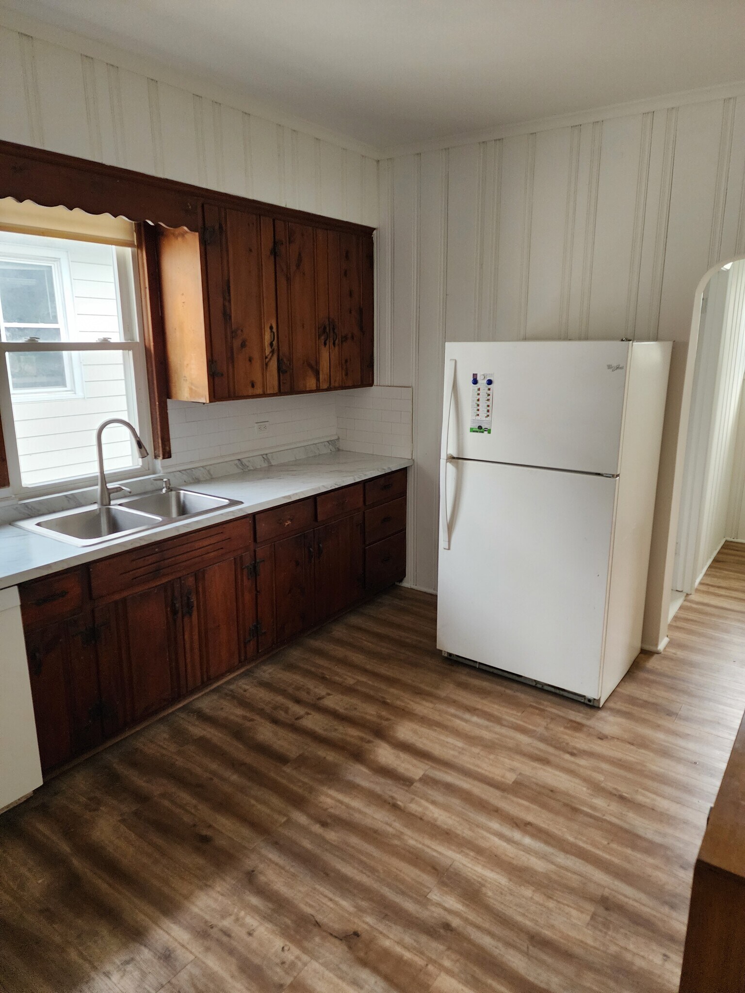 Kitchen with fridge - 303 S 3rd Ave
