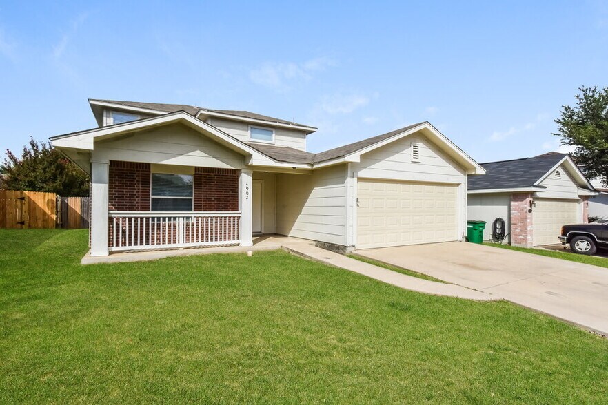 Building Photo - 4902 Dahlia Terrace