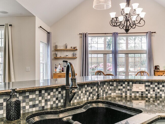 Building Photo - This stunning 4-bedroom, 3.5-bathroom home...