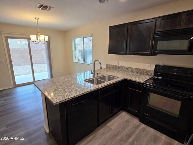 Building Photo - 6063 E Sotol Dr