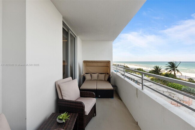 Building Photo - 5555 Collins Ave