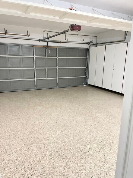 Epoxy flooring with built-in garage cabinet storage - 6 Red Coat Pl