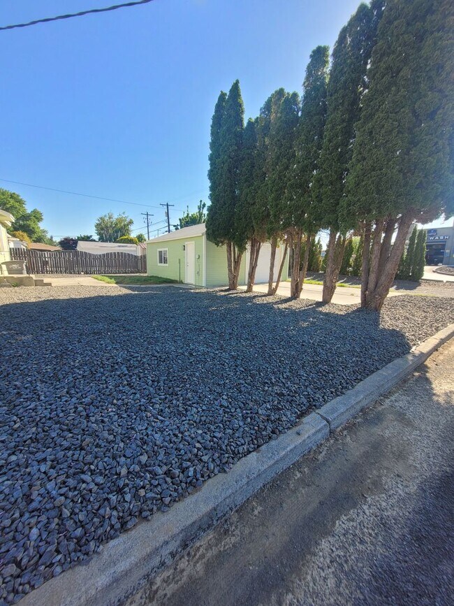Building Photo - Free May rent with 1 Year Lease - Fully Remodeled with Garage & Yard Care Included