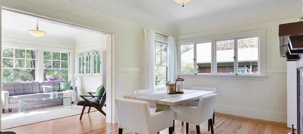 Dining room w/decorative fireplace - 2644 Benvenue Ave