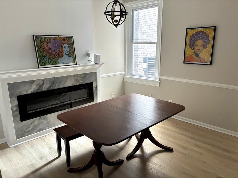 Dining Room w/ Fireplace - 832 W 35th St