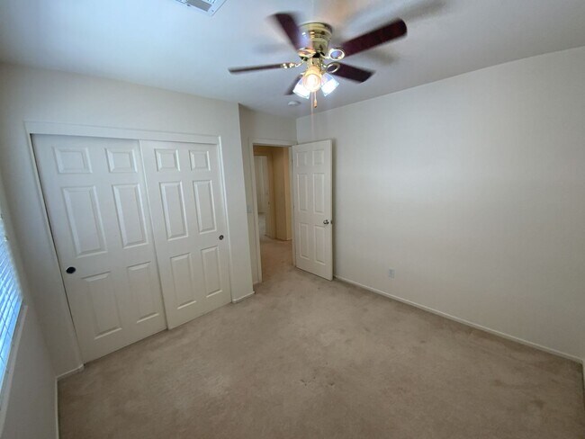 Building Photo - 4 bedrooms and 2.5 bathrooms 2-story home located in Henderson, NV!