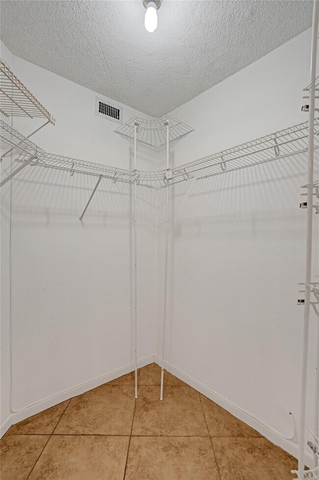 Building Photo - 9351 Lime Bay Blvd