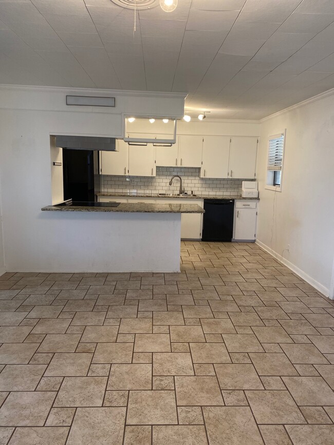 View from dining into kitchen - 2312 Bienville Dr