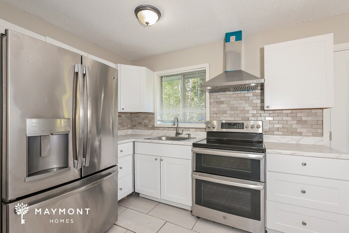 Building Photo - 7050 Merrywood Dr