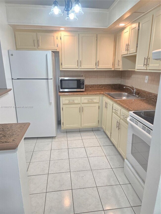 Building Photo - 18875 NW 62nd Ave