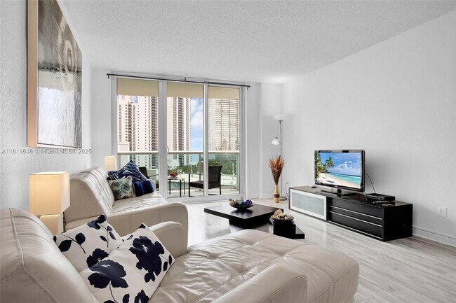 Building Photo - 19370 Collins Ave