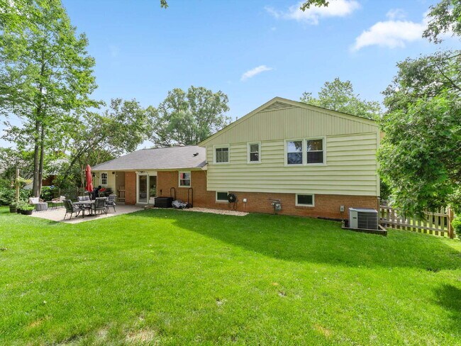 Building Photo - Beautifully Updated Home with Finished Lower Level, Fenced Yard & Exceptional Outdoor Living