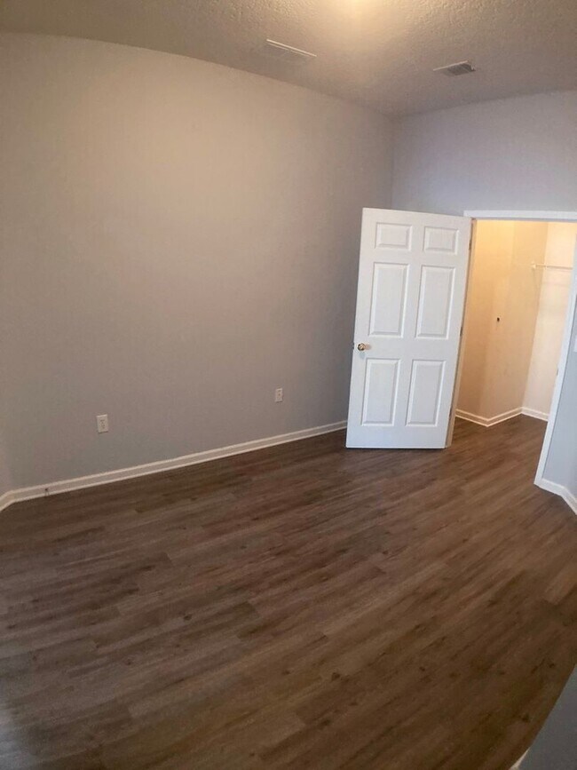 Building Photo - Spacious 3-Bedroom Condo with Pond Views &...