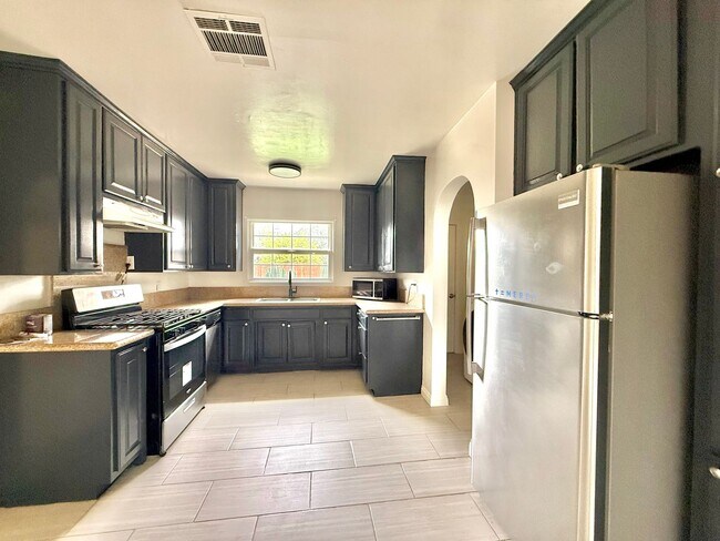 Building Photo - Spacious Three-Bedroom Two-Bathroom Home with large yard $3,095