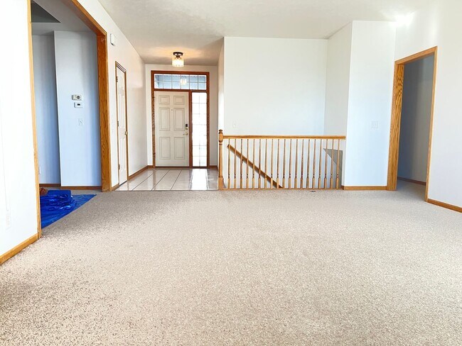 Building Photo - Northwest Omaha Gem: 2,700 Sq Ft, 3-Bedroom, Walk-Out Finished Basement, Fenced Yard, 3-Car Garag...