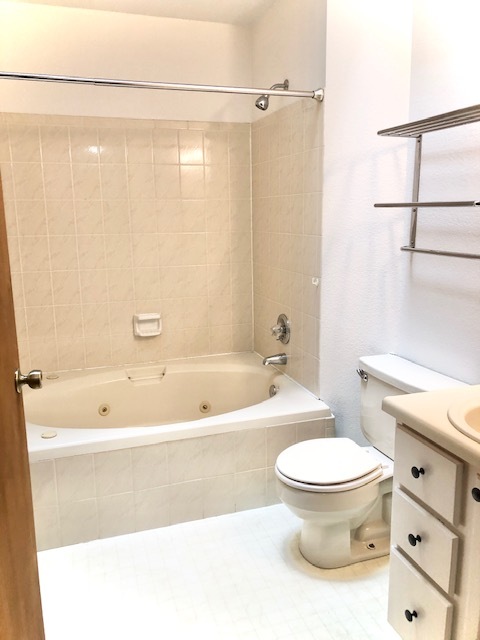 main level guest bathroom - 8659 Chancellor Dr