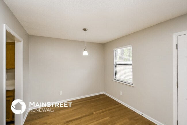 Building Photo - 7969 Sweet Rose Ln E