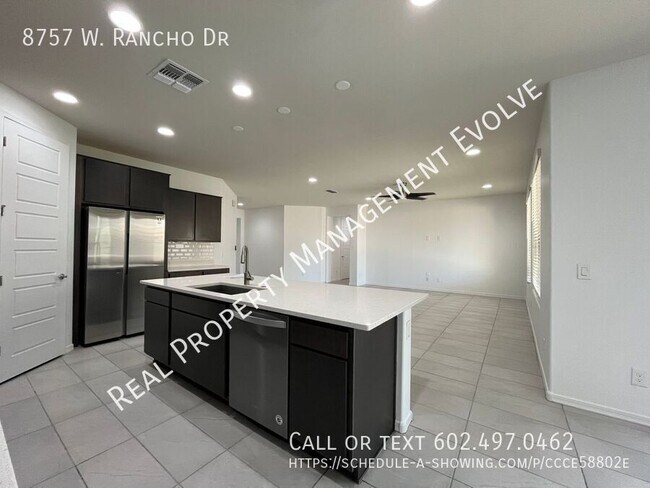 Building Photo - 8757 W Rancho Dr