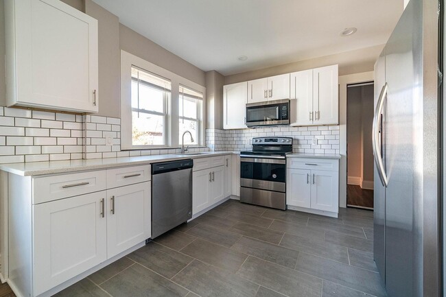 New shaker cabinets and stainless steel appliances. - 222 Parkwood Ave