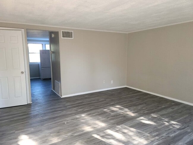 Building Photo - Coming soon newly remodeled three bedroom ...