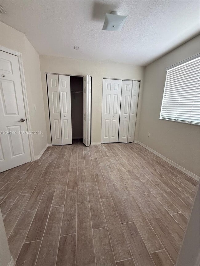 Building Photo - 10644 NW 87th Ave