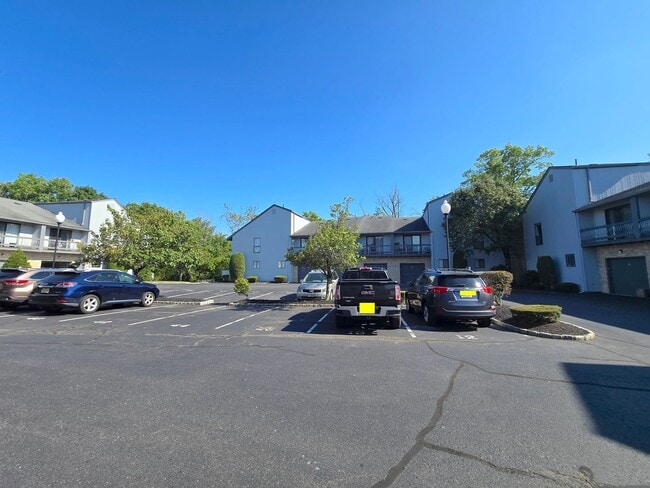 Building Photo - Spacious, freshly painted end-unit townhou...