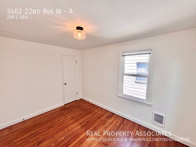 Building Photo - 3402 22nd Ave W