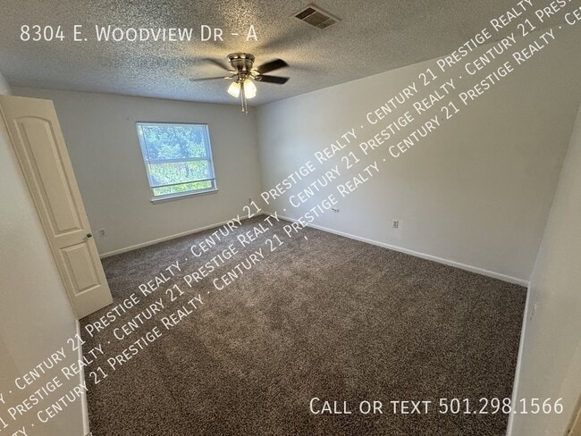 Building Photo - 8304 Woodview Dr N