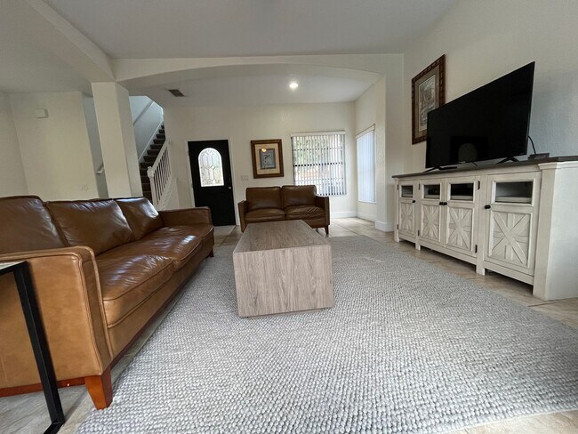 Building Photo - Beautiful Mediterranean Pool Home Availabl...