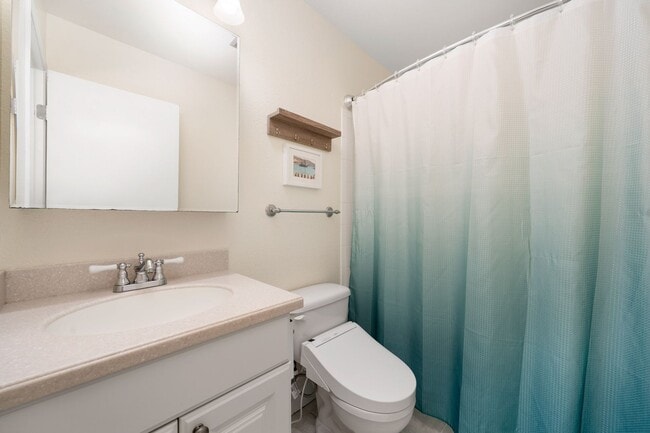 Building Photo - Seawind Upper Unit with Vaulted Ceilings a...