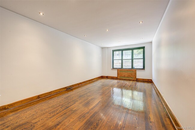 Building Photo - 34-40-40 79th St