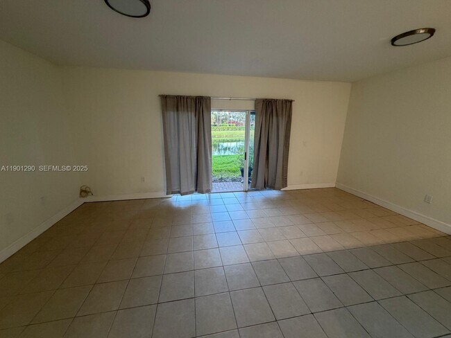 Building Photo - 3390 NE 13th Cir Dr