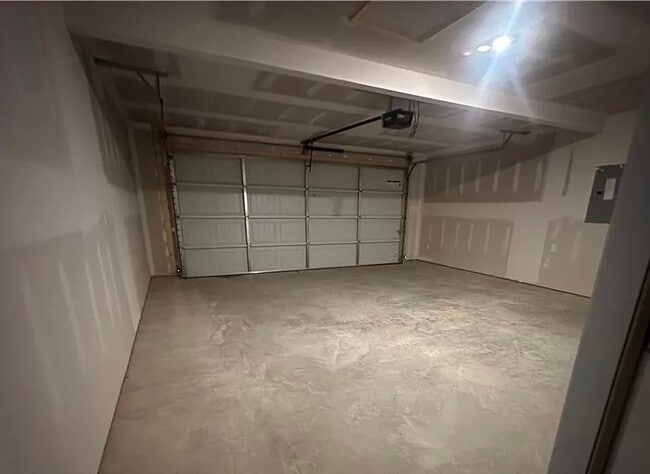 Building Photo - One Level/Four Bed/Two Bath/Two Car Garage...