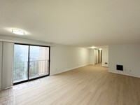 Building Photo - Top-Floor Magnolia Condo (brand-new wooden...