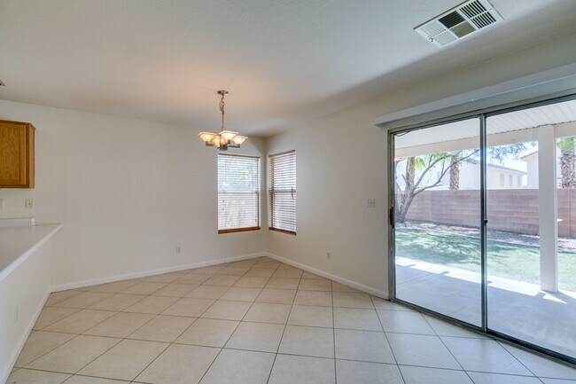 Building Photo - Spacious 4 Bedroom 2.5 Bathroom Home with Covered Patio & Large Backyard