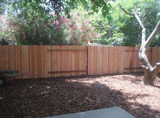 back yard (partial) of 2122. 2124 is the same size. Not shown: Large shade trees in each yard. - 2122 E 8th St