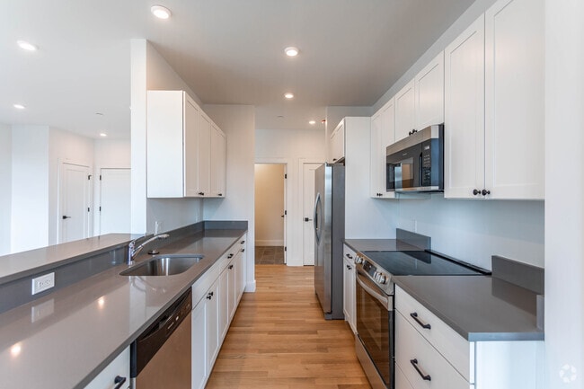 Unit 402 kitchen. - Residence at 581 Salem St