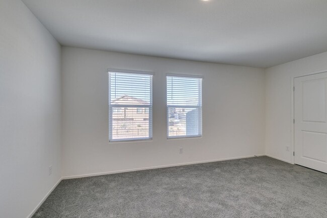 Building Photo - Gorgeous Townhome with upgrades in gated community* 3 large bedrooms, 2 car garage*Community pool...