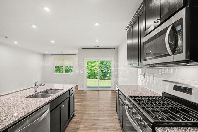 Building Photo - 9512 Munsing Dr
