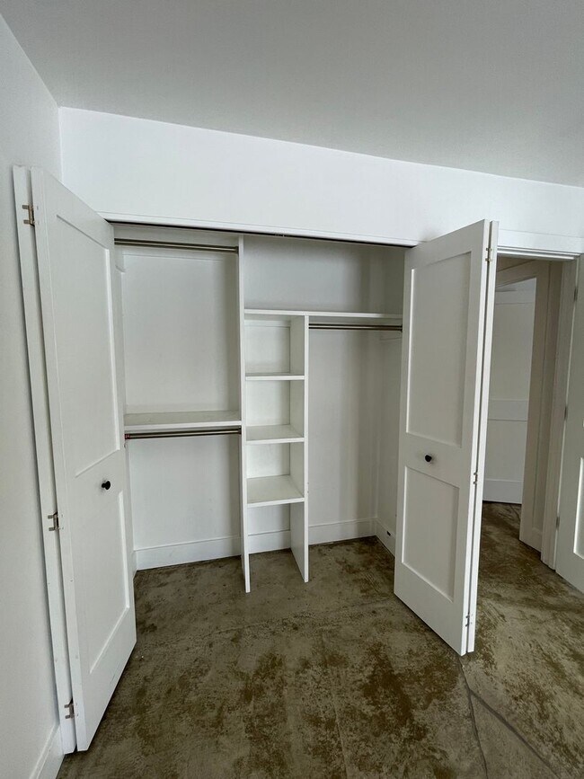 Building Photo - Updated Two Bedroom in Cherboneau North | Quiet, Private Setting Marketing Description