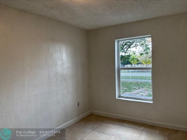 Building Photo - 10635 NW 12th Ave