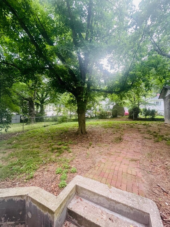 Building Photo - Bungalow in Kannapolis with Rocking Chair ...