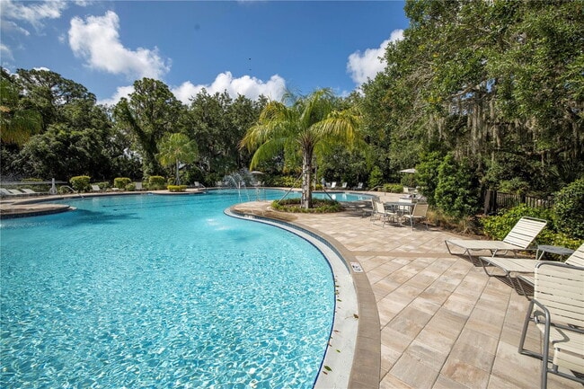 Building Photo - Open Floor Plan! Nice corner lakefront home!  Community pool, playground and walking trails.