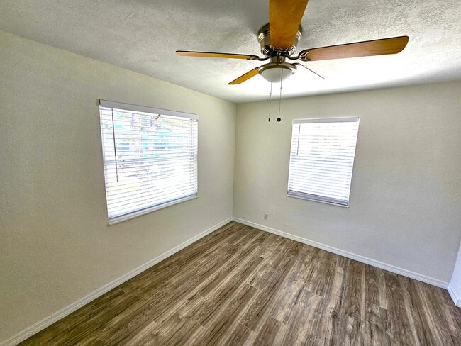 Building Photo - fully renovated 2-bedroom, 1-bathroom home with bonus guest room or office and oversized fenced yard