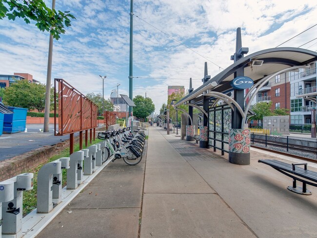 Building Photo - Live ON the light rail and in the heart of...