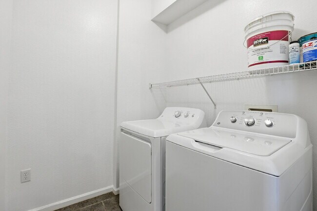 Building Photo - $1,690.95, 2-bed, 2-bath condo in a gated community with a washer/dryer.