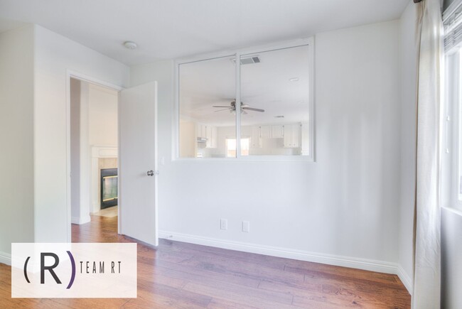 Building Photo - A Captivating and Charming 2 Story Home Ne...