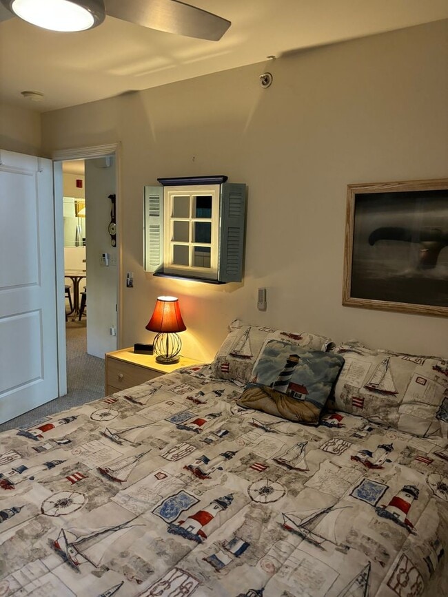 Building Photo - Move-In Ready 2BR/2BA Condo – Fully Furnished, AC, Washer/Dryer, 2 Parking stalls